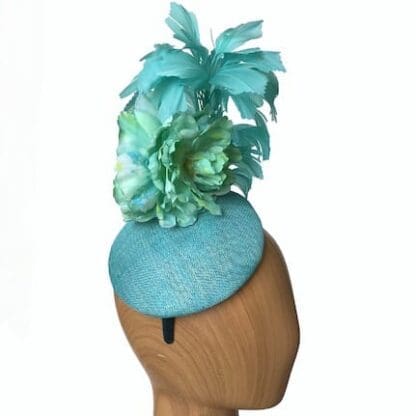 turquoise curled feathers fascinator