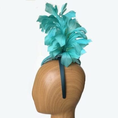 turquoise curled feathers fascinator