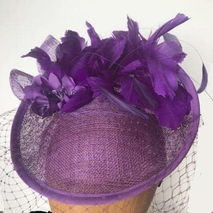 purple feathered fascinator