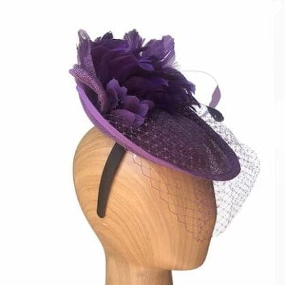 purple feathered fascinator