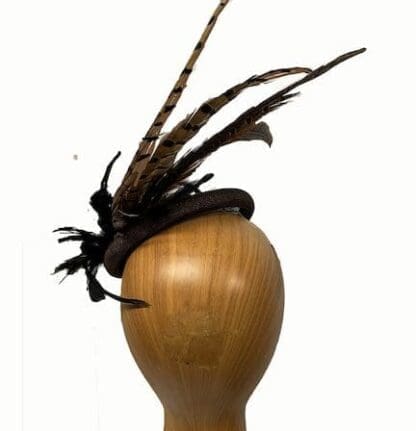 brown fascinator with feathers