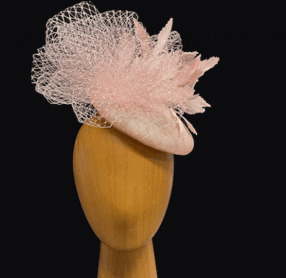 pink feather and net fascinator