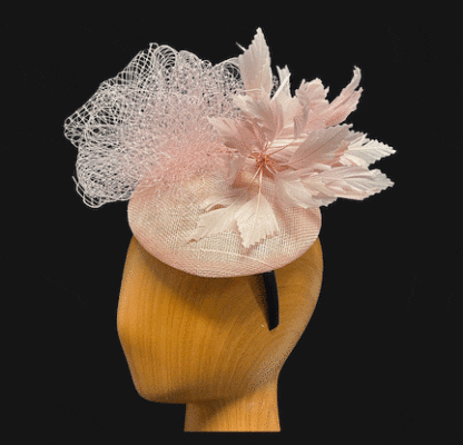 pink feather and net fascinator