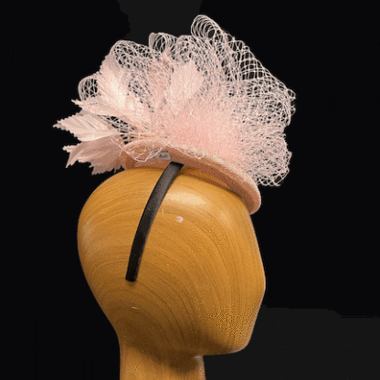 pink feather and net fascinator