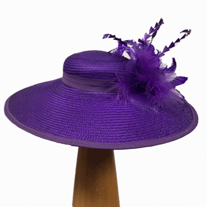 Purple feathered derby hat