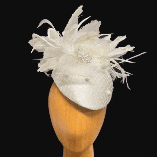 Ivory oval pillbox feathered fascinator