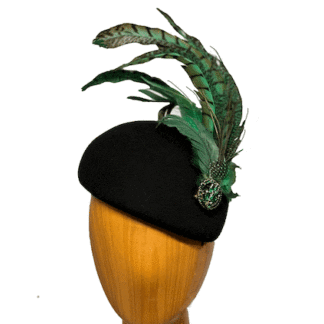 Black wool hat green feathers
