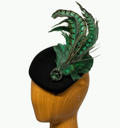 Black wool hat green feathers