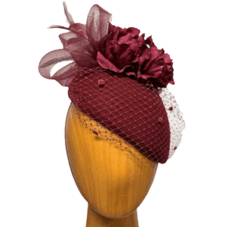 magenta wool hat with flowers and crin