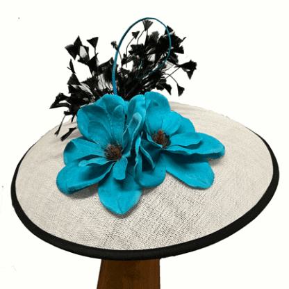 White saucer fascinator with turquoise and black