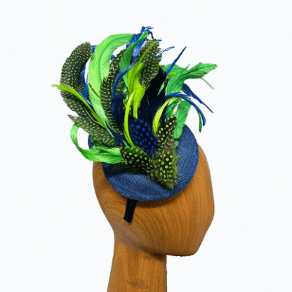 ue and green feather plumed fascinator