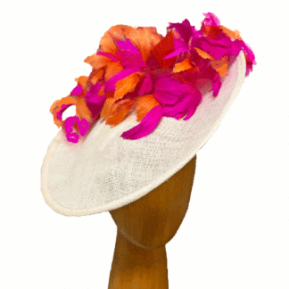 Ivory fascinator with orange and fuchsia feathers