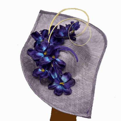 Lilac fascinator with purple and royal blue flowers