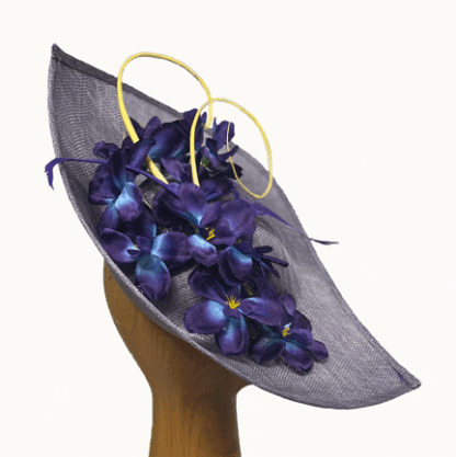 Lilac fascinator with purple and royal blue flowers