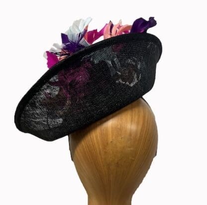 Black and multi colored feathered fascinator