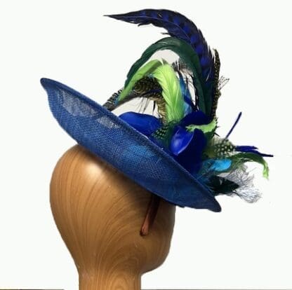 Royal Blue fascinator with green blue peacock feathers