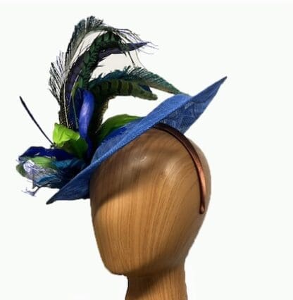 Royal Blue fascinator with green blue peacock feathers
